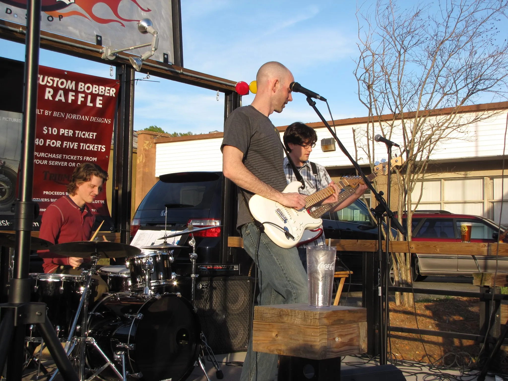 Nathan Hughes playing electric guitar at a solo gig